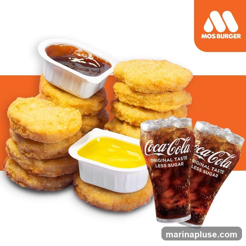 A promotional image featuring stacks of chicken nuggets with dipping sauces and two glasses of Coca-Cola Original Taste Less Sugar. The Mos Burger logo is visible in the upper right corner.