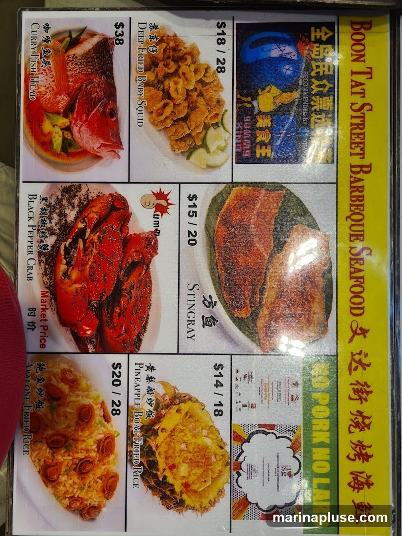 A menu featuring various seafood dishes and fried rice options.