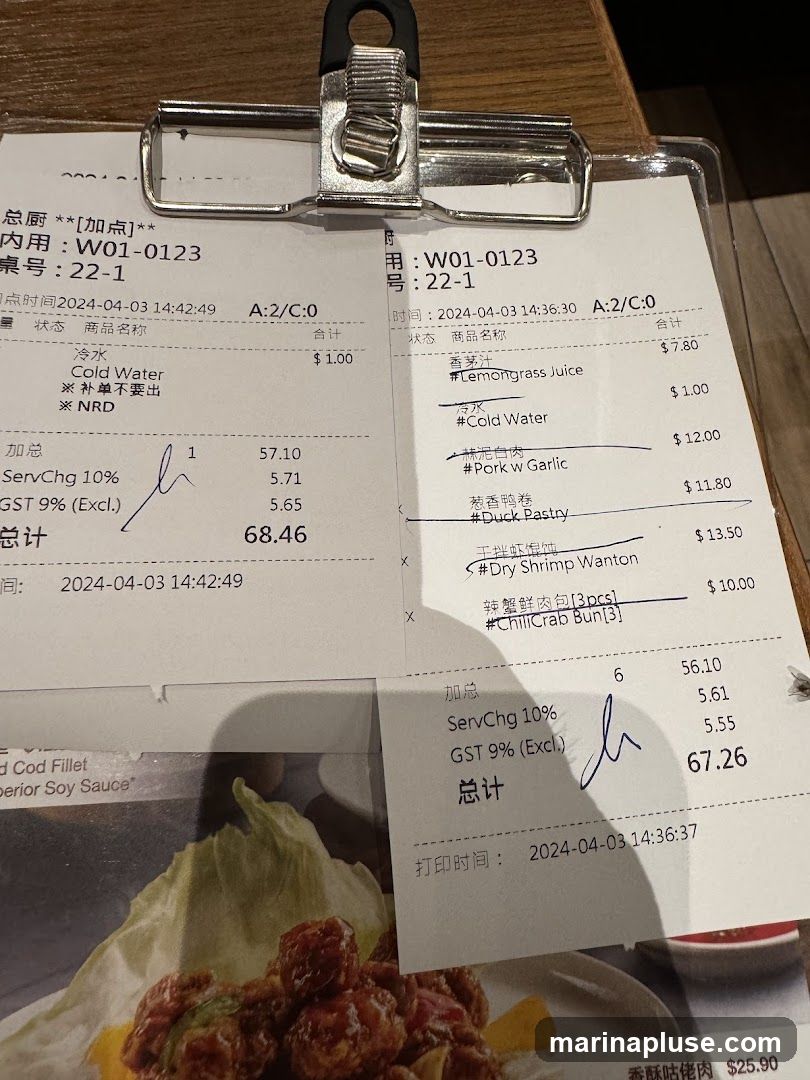 Two order slips with itemized lists and totals.