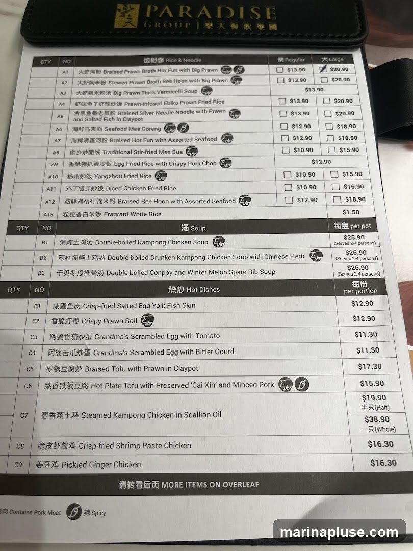 A menu from Paradise Group featuring Rice & Noodle dishes, Soups, and Hot Dishes.
