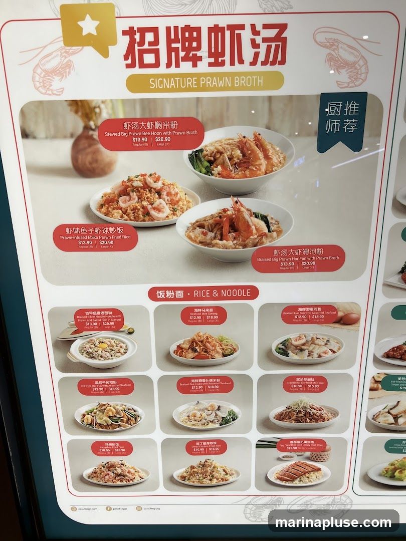A menu featuring prawn broth dishes and rice/noodle options.
