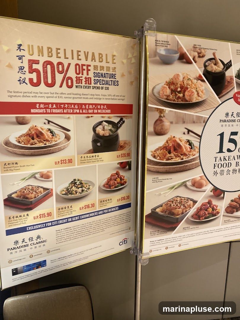 A promotional poster for Paradise Classic offering 50% off signature specialties with every spend of $30. The offer is valid from Mondays to Fridays after 3 PM and all day on weekends. Several dishes are pictured with their prices, including Braised Prawn Broth Hor Fun with Big Prawn (U.P. $13.90), Double boiled Winter Melon Spare Rib Soup (U.P. $26.90), Hot Plate Tofu with Preserved 'Cai Xin' and Minced Pork (U.P. $15.90), Poached Spinach with Egg Trio in Superior Stock (U.P. $16.30), and Crispy Sweet and Sour Pork (U.P. $16.30). The promotion is exclusively for Citi credit or debit cardmembers and PGR members. Another poster advertises 15% off takeaway food.