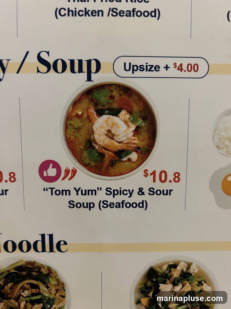 A menu section featuring soups, with an image of Tom Yum soup.