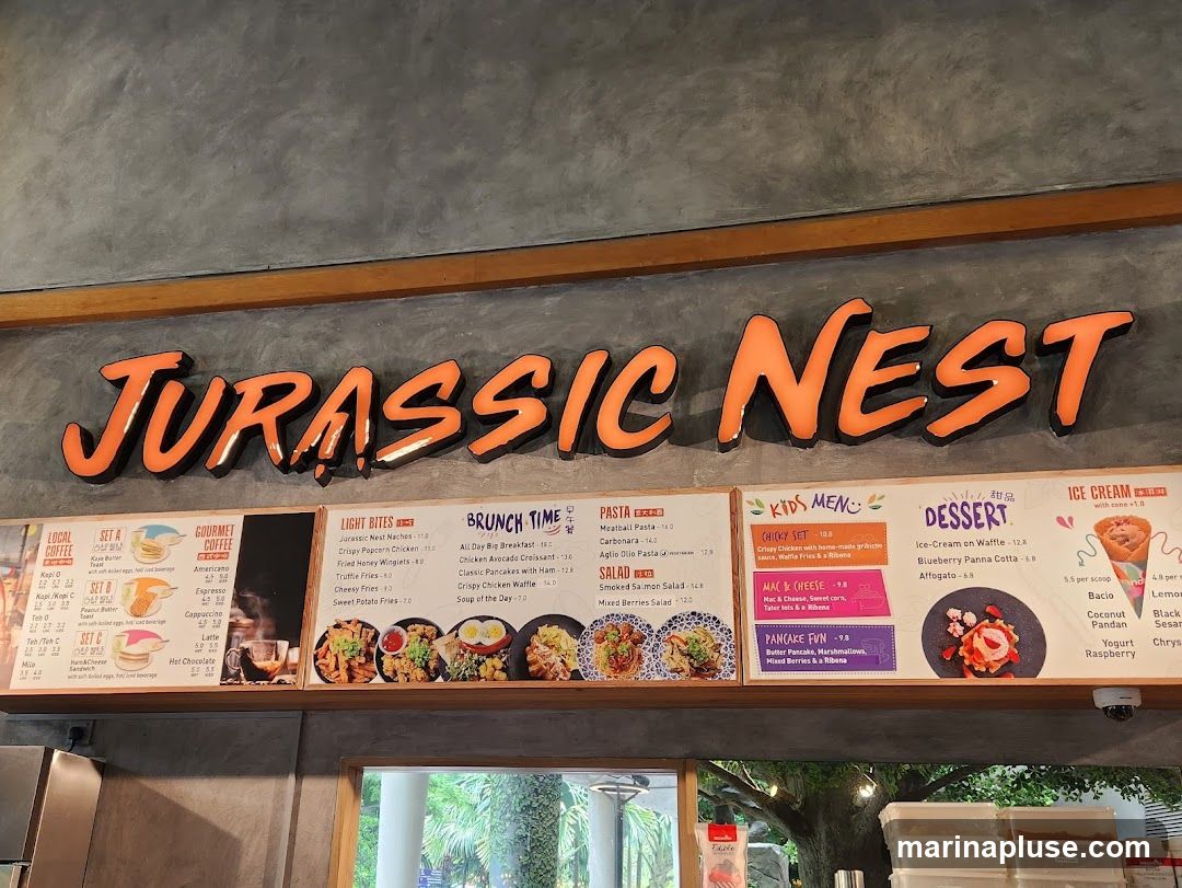 A menu board with various food and drink options, including local coffee, gourmet coffee, light bites, brunch items, pasta, salads, kids' meals, desserts, and ice cream.