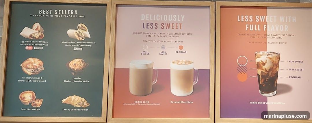 Three menu boards displaying best sellers and drink options. The first board shows food items like wraps, croissants, muffins, pies, and foldovers. The second and third boards highlight drink options with varying sweetness levels, featuring Vanilla Latte, Caramel Macchiato, and Vanilla Sweet Cream Cold Brew.