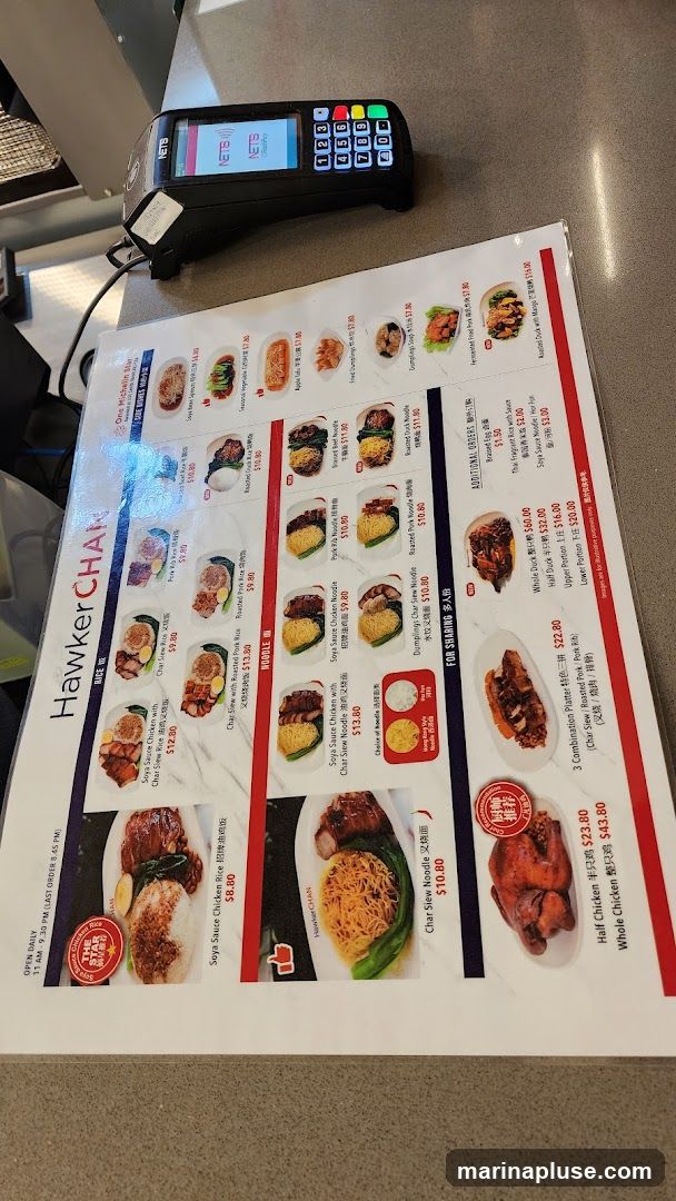 A menu for Hawker Char featuring rice dishes, noodle dishes, and items for sharing.