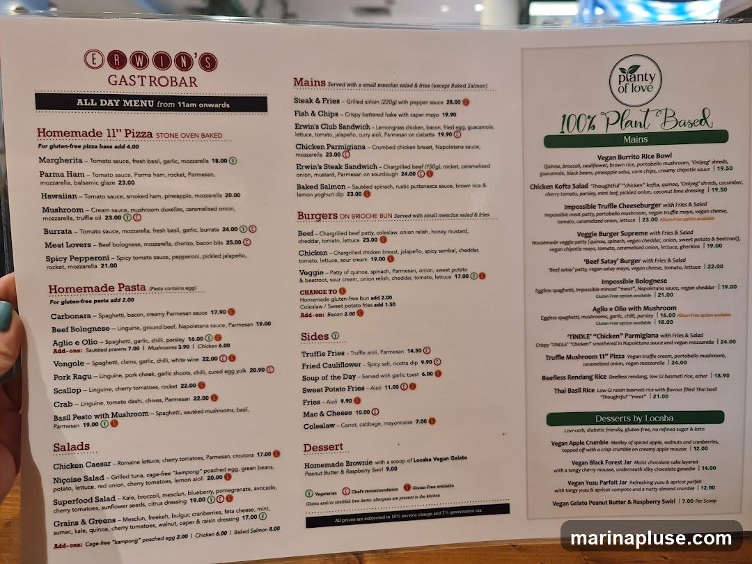 Menu from Erwins Gastrobar with a variety of pizzas, pastas, salads, mains, burgers, sides, and desserts.