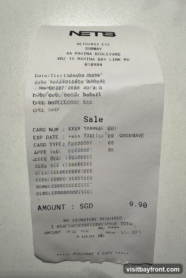 A receipt from Subway showing a sale transaction. The total amount is SGD 9.90.