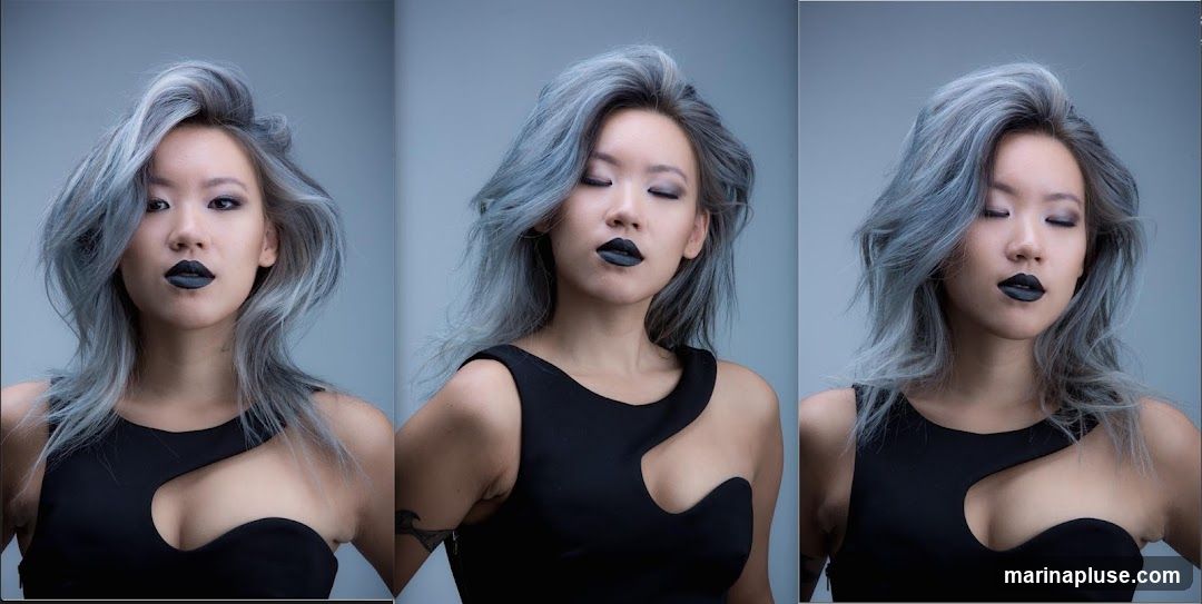 A triptych of a woman with blue-grey hair styled in loose waves. She has dramatic eye makeup and is wearing black lipstick. She is wearing a black dress with an asymmetrical cutout on the chest. The background is a solid grey.