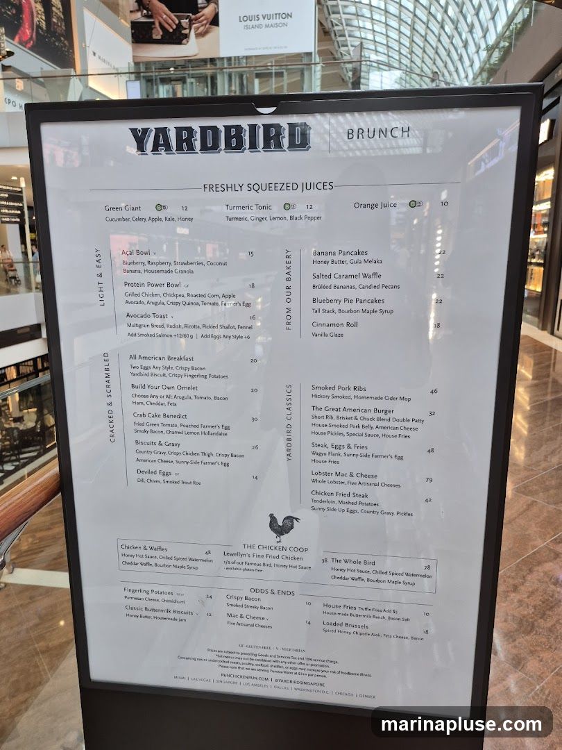 A menu board for Yardbird featuring brunch items, freshly squeezed juices, and bakery items.