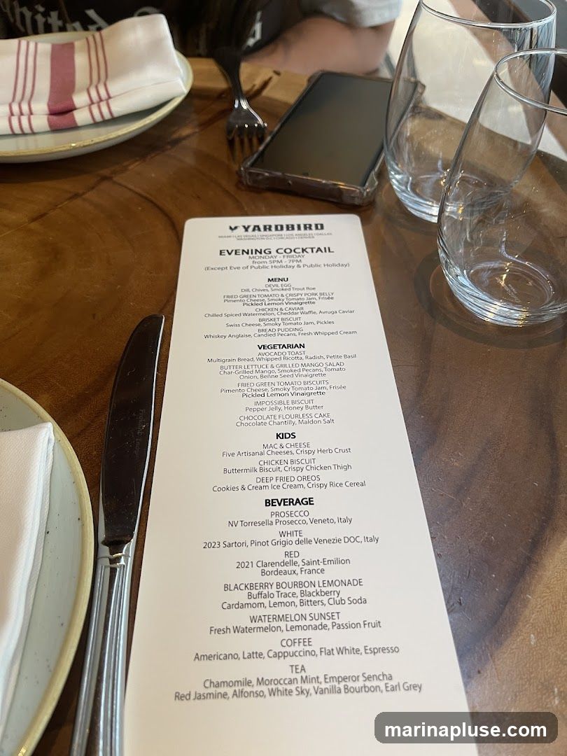 Evening Cocktail menu for Yardbird, available Monday-Friday from 5 PM - 7 PM. Includes appetizers, vegetarian options, kids' meals, and beverages.
