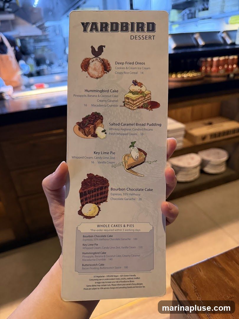 A dessert menu from Yardbird featuring various cakes, pies, and other sweet treats.