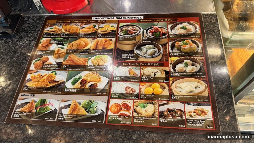 A menu featuring various dim sum items, categorized into Pan-fried/Deep-fried, Steamed, and Handmade Pau.