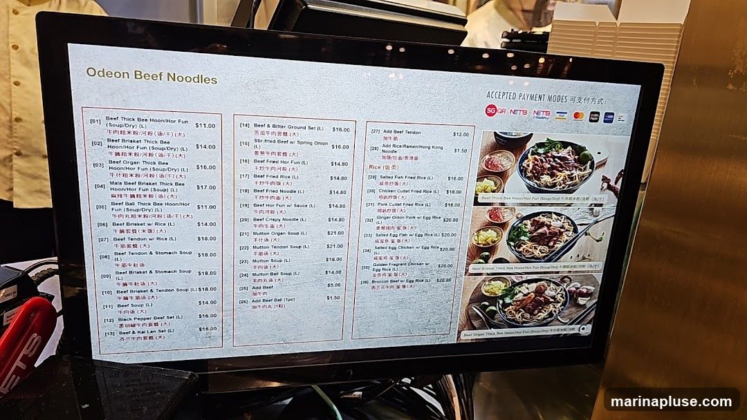A digital menu displaying various beef noodle dishes, sets, and rice options.