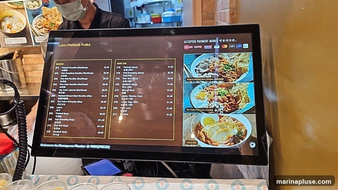 A digital menu displaying mains and add-on items for Lixin Fishball Folks. Accepted payment modes are also shown.