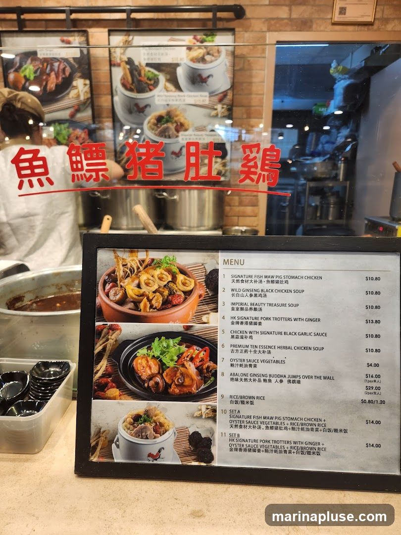 A menu board displays various soups, dishes, and set meals with prices.