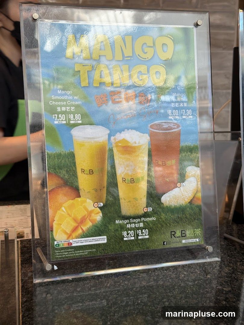 A menu board featuring mango-themed drinks.