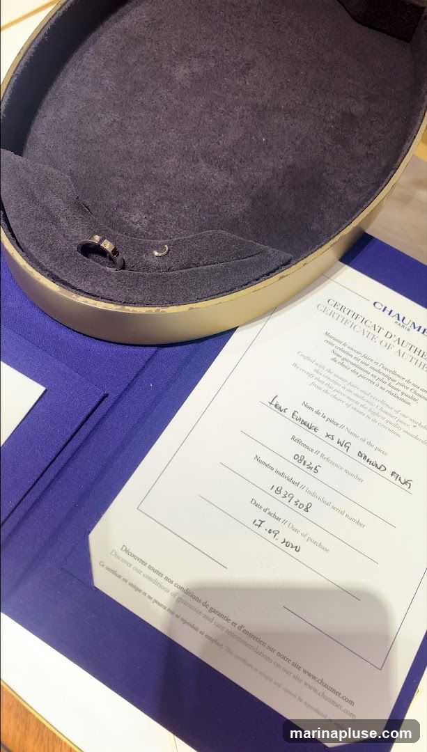 A Chaumet certificate of authenticity for a diamond ring is shown, along with the ring in its presentation box. The certificate details the name of the piece as 'LIENS EVIDENCE XS WG DIAMOND RING', the reference number '080315', the individual serial number '1839308', and the date of purchase as '17.09.2020'.