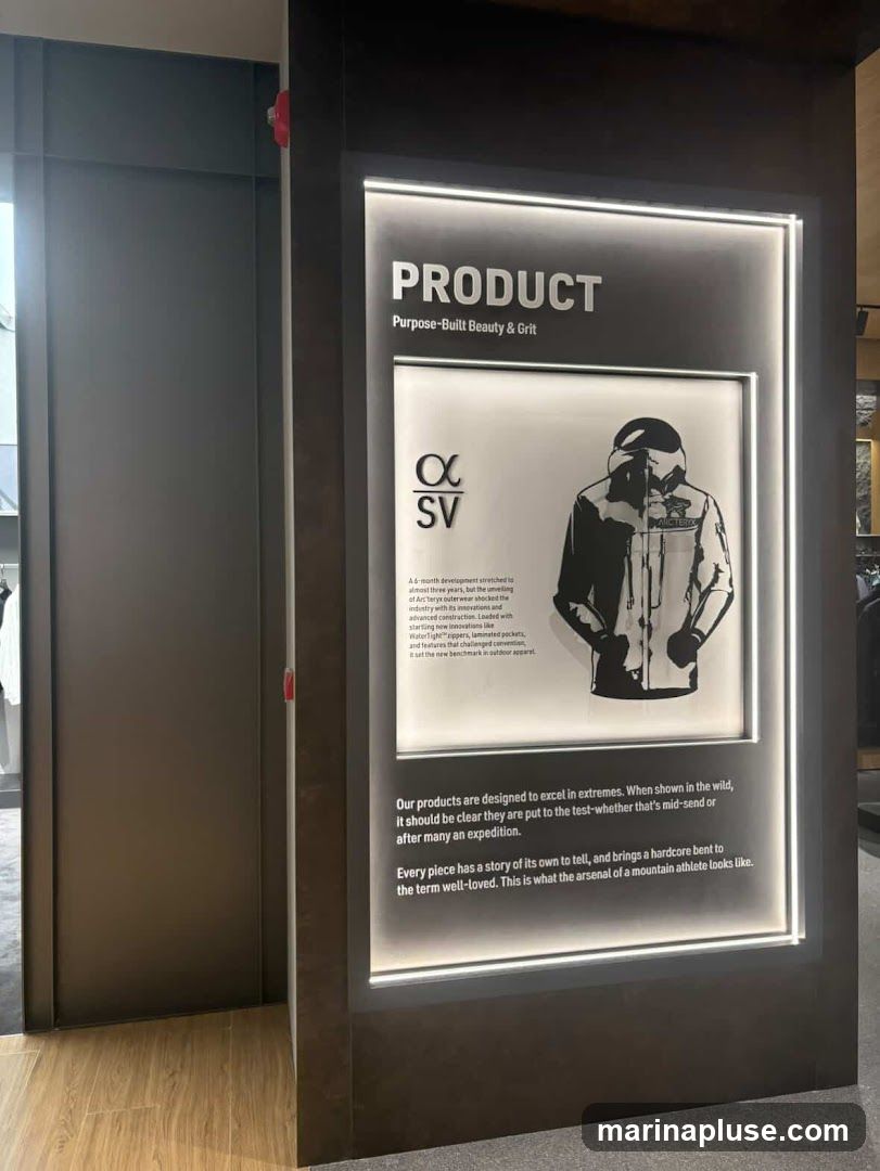 A display panel with the word "PRODUCT" and the tagline "Purpose-Built Beauty & Grit". Below this is an illustration of a jacket with the logo "α SV". Text describes the product development and its suitability for extreme conditions.