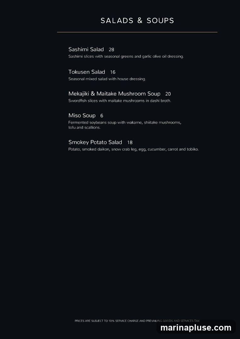 A menu listing salads and soups with descriptions and prices.