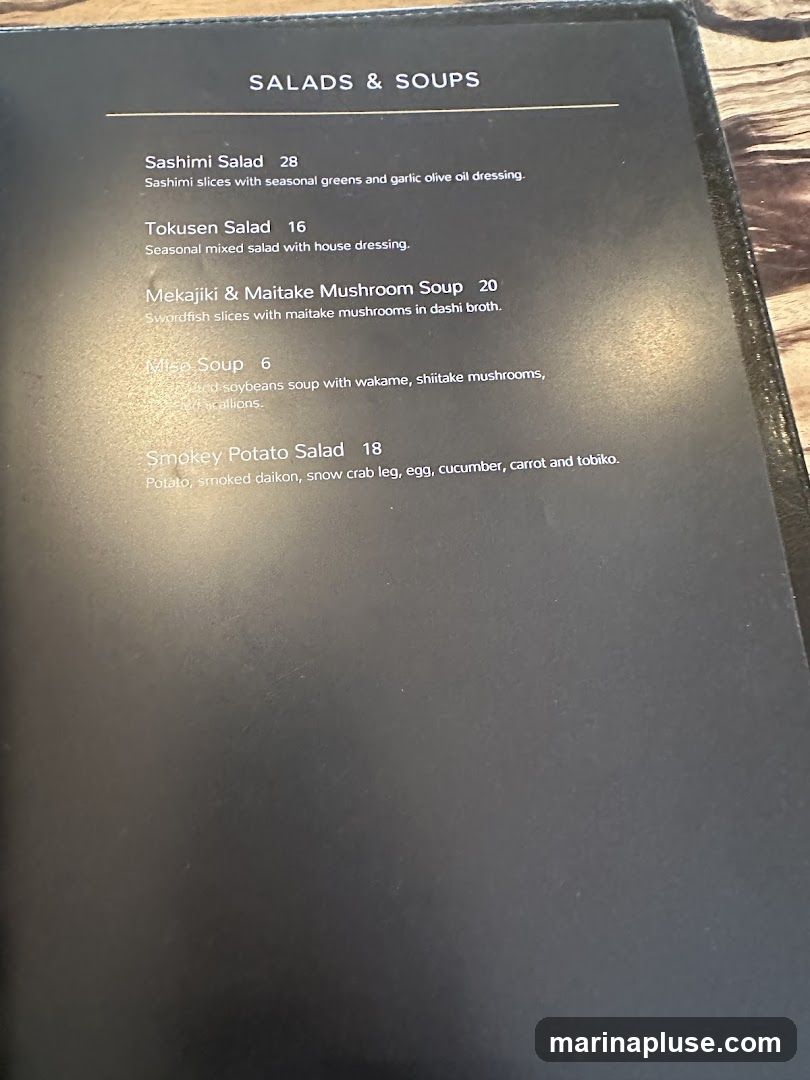A menu page listing salads and soups.