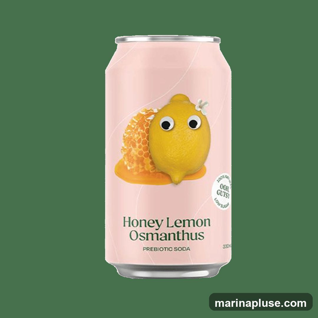 A light pink soda can with a cartoon lemon character and honeycomb. The text on the can reads \