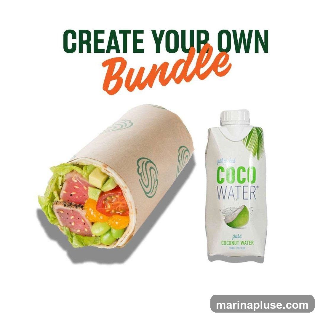 A wrap filled with tuna, avocado, tomatoes, and edamame, next to a carton of Coco Water.