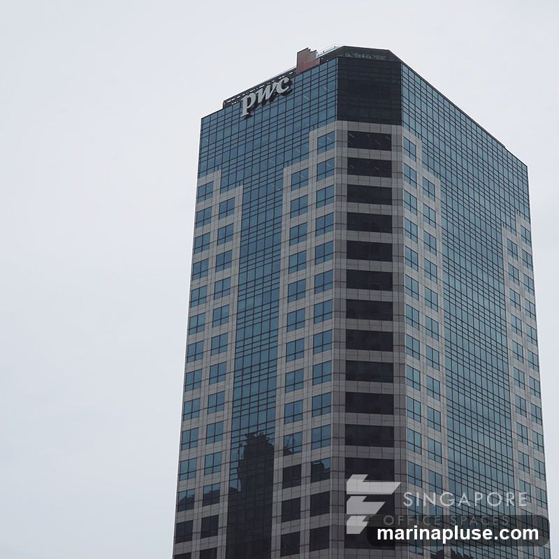 A tall, modern skyscraper with a glass facade. The PwC logo is visible at the top of the building. The sky is overcast. A watermark for "Singapore Office Spaces" is present at the bottom right.