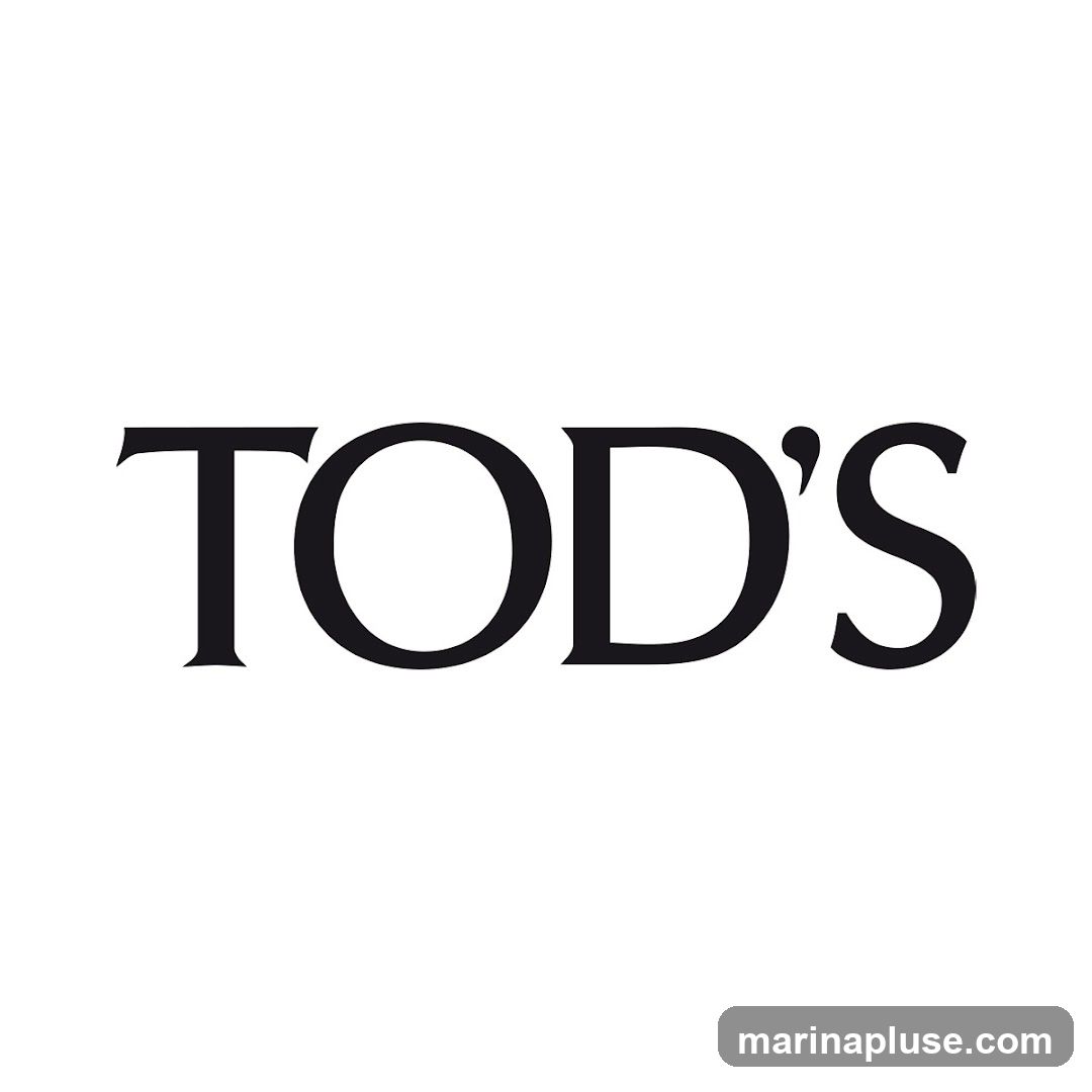 The image displays the TOD'S logo in black text on a white background. The text is in a serif font, with the letters T, O, D, and S clearly visible, along with an apostrophe after the D.