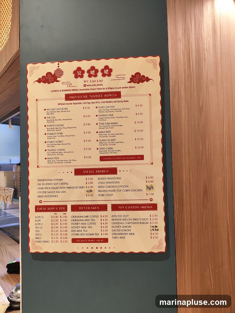 Menu for Wu Lao Lao, offering noodle bowls, small dishes, local kopi & teh, beverages, and non-caffeine drinks. Available from 11am to 8:30pm.