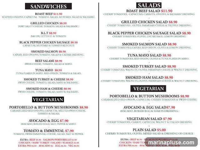 A menu with two columns, one for sandwiches and one for salads. Both columns list various meat and vegetarian options with descriptions and prices.
