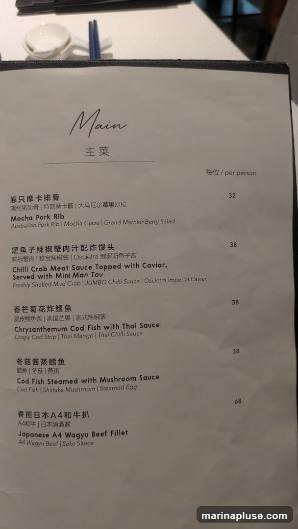 A menu page with main courses listed in English and Chinese.