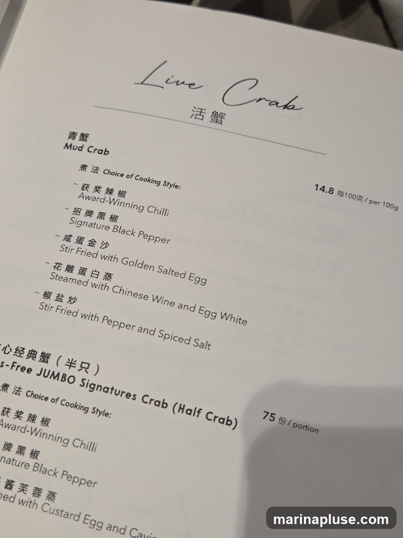 Menu featuring live crab dishes with various cooking styles.