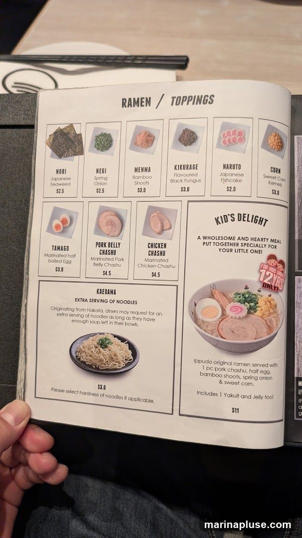 A menu page showing various ramen toppings and a kids' meal.