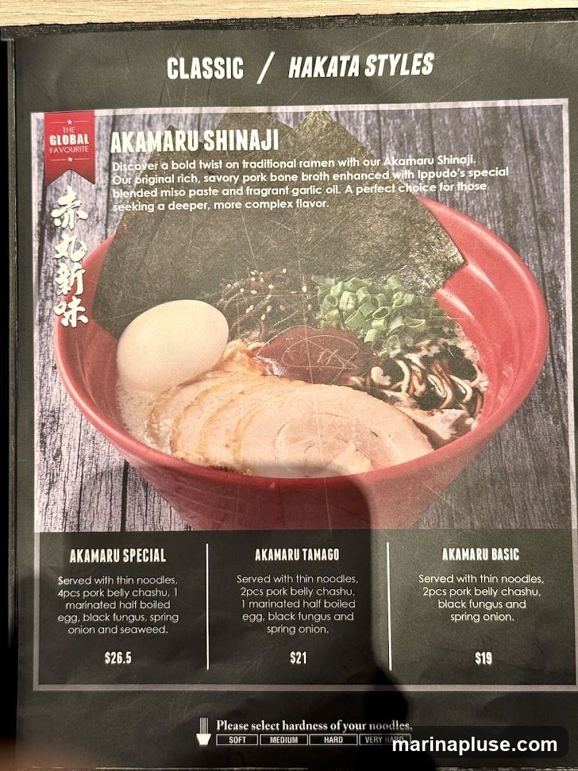 Classic / Hakata Styles. Discover a bold twist on traditional ramen with our Akamaru Shinaji. Our original rich, savory pork bone broth enhanced with Ippudo's special blended miso paste and fragrant garlic oil. A perfect choice for those seeking a deeper, more complex flavor.