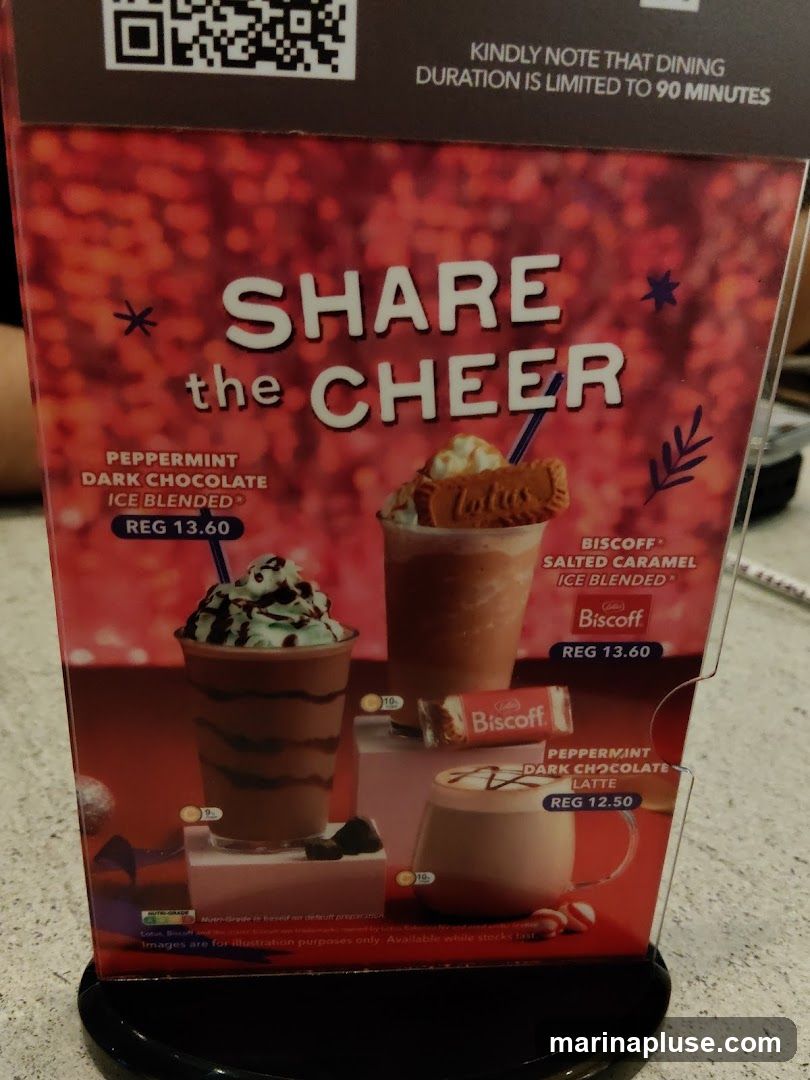 A menu display featuring holiday-themed drinks.