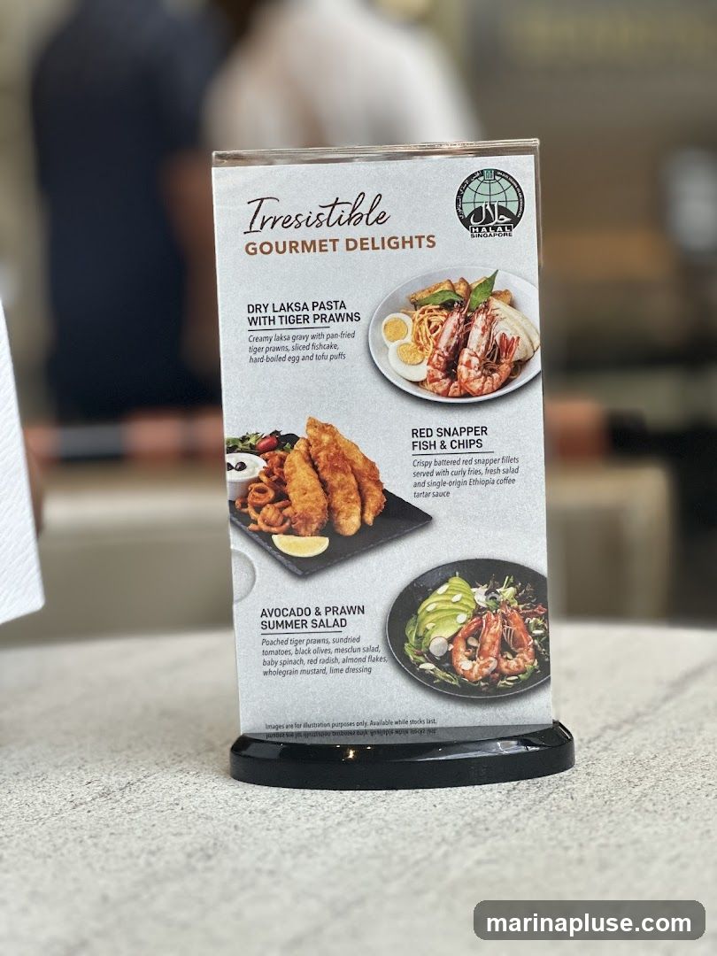 A table tent menu featuring three gourmet dishes with accompanying images.