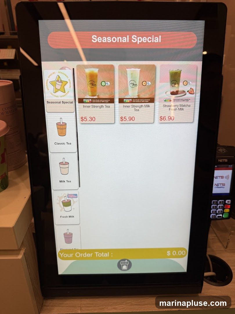 A digital menu displaying seasonal specials and other tea options.