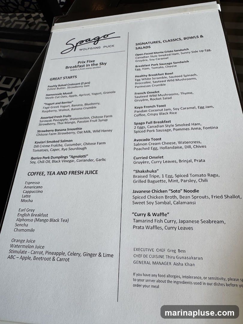 A breakfast menu with sections for Great Starts, Coffee Tea and Fresh Juice, and Signatures Classics Bowls & Salads.