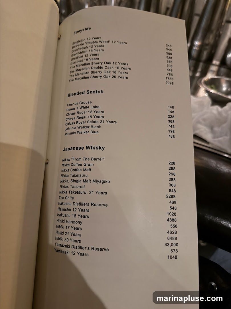 A menu featuring Speyside, Blended Scotch, and Japanese Whisky selections.