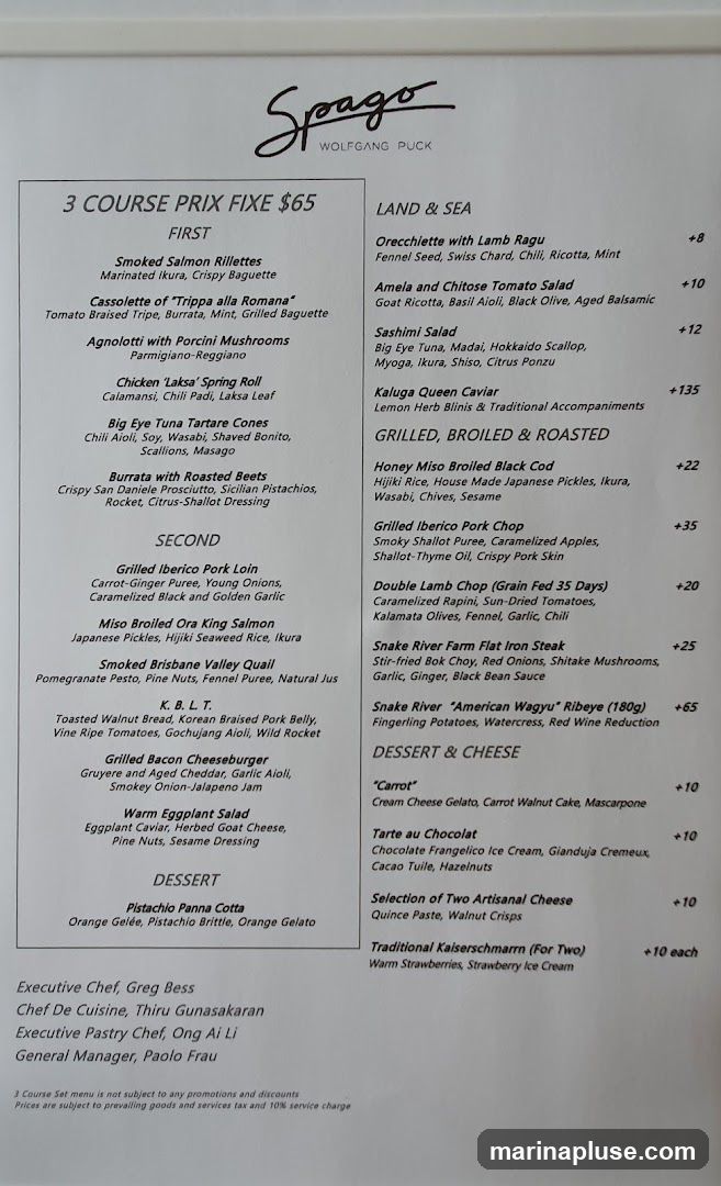 A menu with a 3-course prix fixe option for $65, and a la carte selections under Land & Sea, Grilled, Broiled & Roasted, and Dessert & Cheese categories.