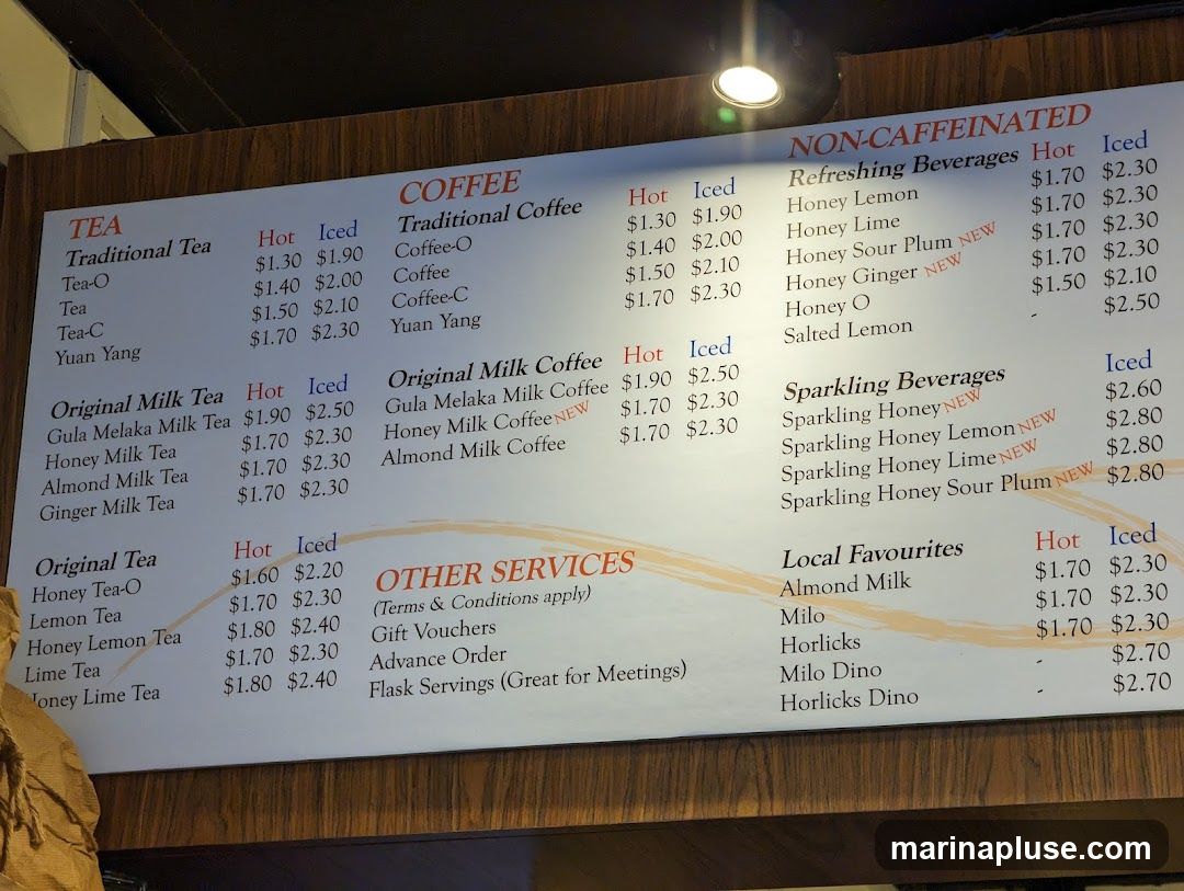 A menu board with various tea, coffee, non-caffeinated beverages, and local favorites.