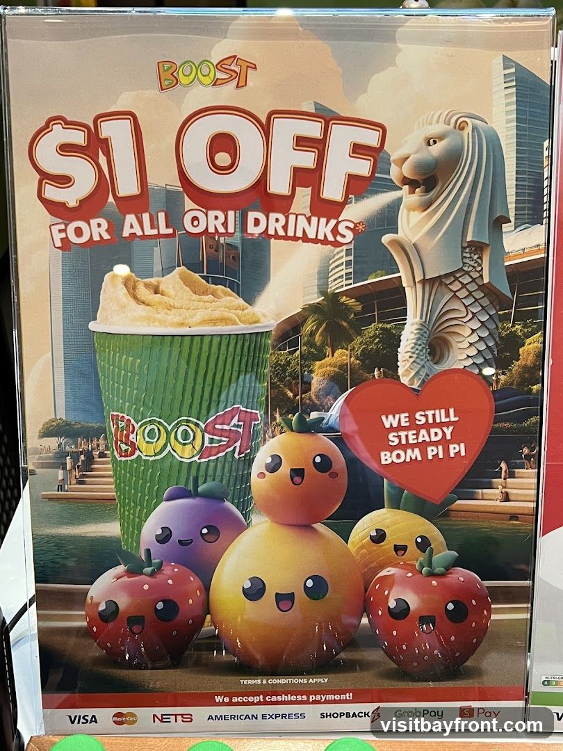 A promotional poster for Boost offering $1 off all Ori drinks. The poster features cartoon fruits, a cup of Boost drink, and the Merlion statue with the Singapore skyline in the background. It also includes payment method logos and a tagline.