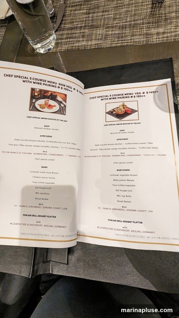 Two versions of a 5-course chef special menu, one non-veg and one veg, both with wine pairing options.