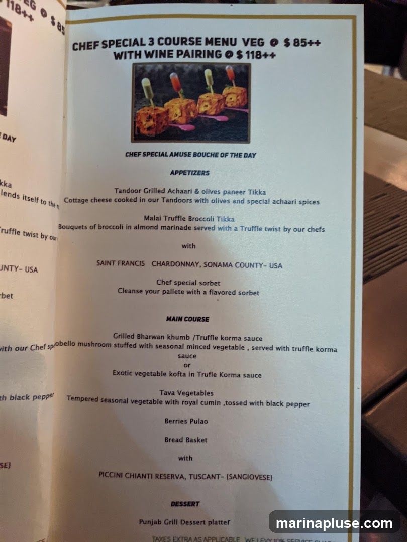 A menu for a 3-course vegetarian meal with wine pairing.