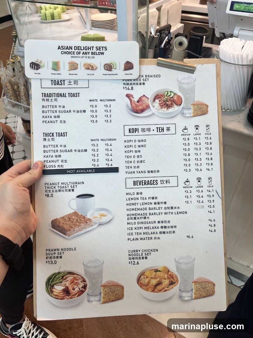 A menu featuring toast, noodle sets, beverages, and coffee/tea options.