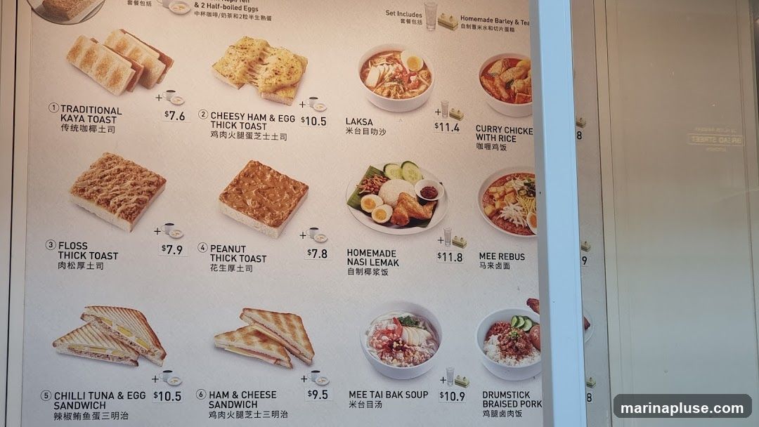 A menu featuring various toast, sandwich, and noodle dishes.