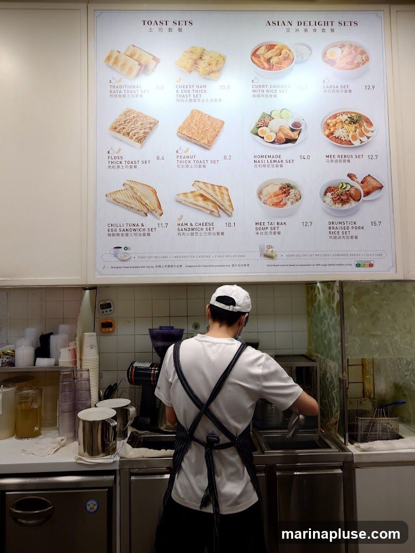 A menu displaying various toast sets and Asian delight sets with images and prices.