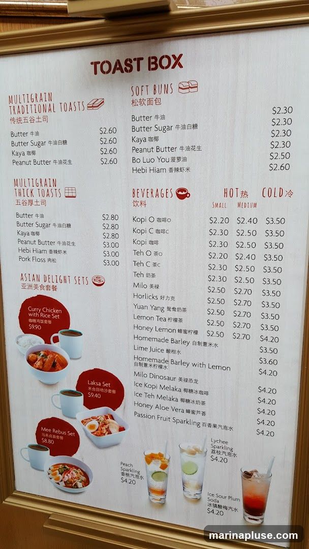 Menu for Toast Box featuring traditional and thick multigrain toasts, soft buns, Asian delight sets, and beverages.