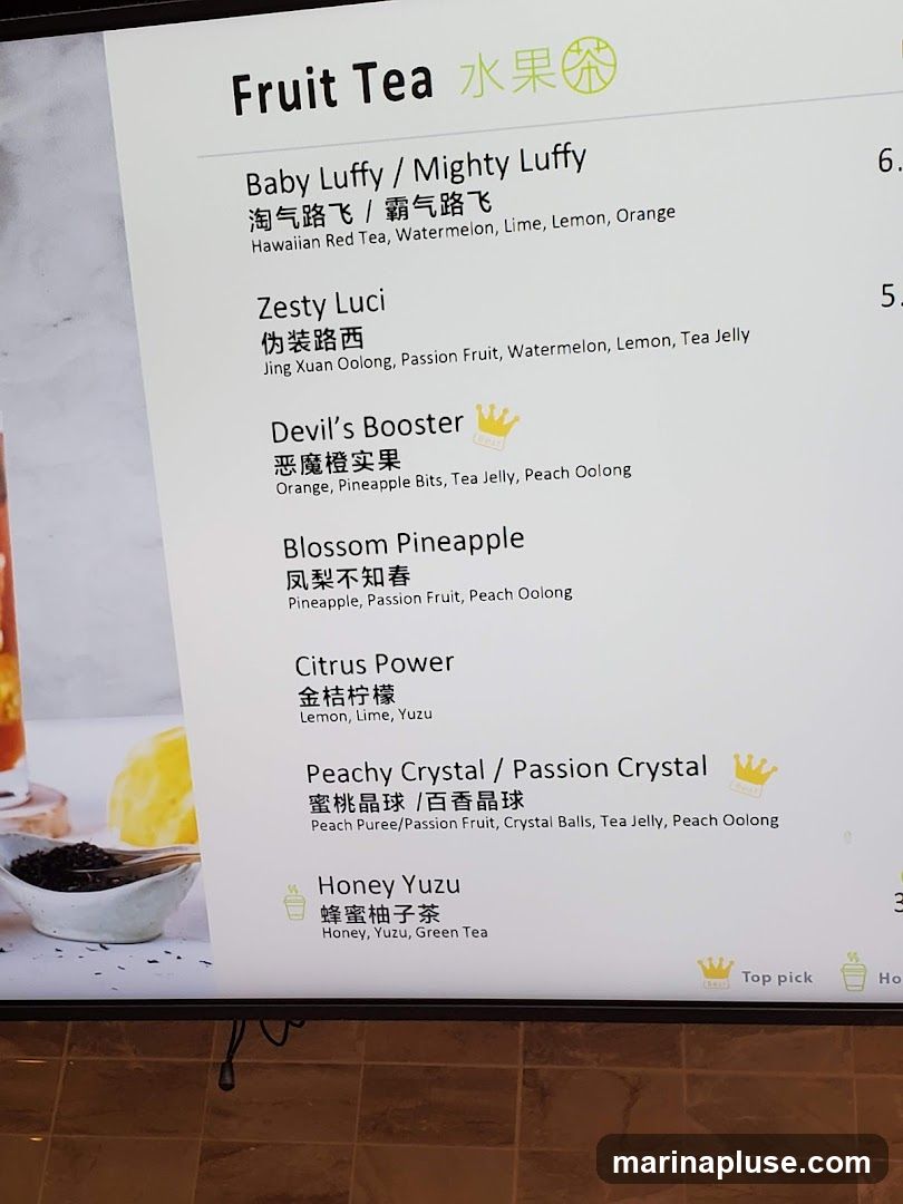 Menu of various fruit teas with ingredients listed.